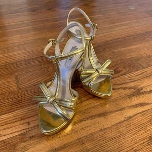 Gold Prada heels